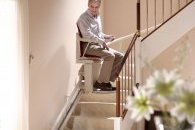 Man using stairlift