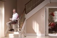 Man using stairlift